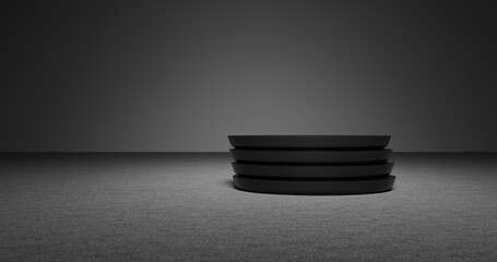 Stack of Black Plates on Dark Floor