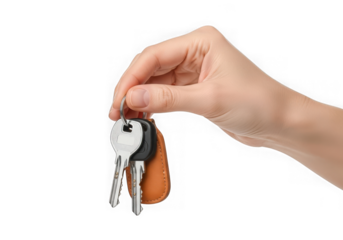 A persons hand holds a set of keys with a leather fob on a keychain isolated on transparent background