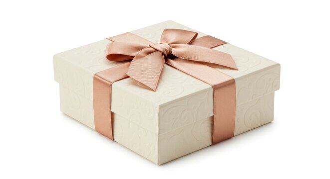 A small, square, textured gift box with a pale cream hue is adorned with a soft pink ribbon tied in a bow, sitting on a white background