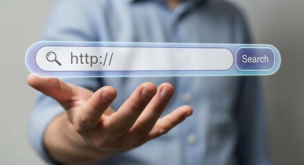 Hand holding a digital search bar with "http://" displayed, suggesting online browsing or internet connectivity.