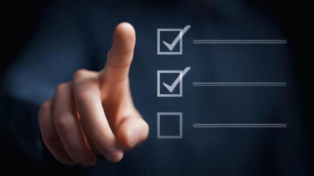 Three bright checkboxes are in a horizontal digital row, with the center one being pressed by a finger, and the rest dark and unpressed, against a simple background, a status update interface.