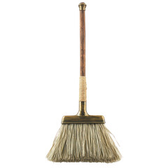 Antique broom with a wooden handle and golden metal accents on a stark black backdrop