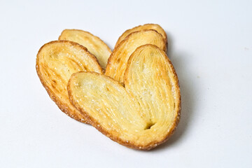 Close up view of three mini pies isolated on white background. Clipping path. Love sign. Butter....