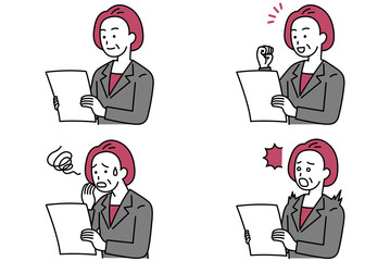 書類を見る中年のスーツの女性　セット