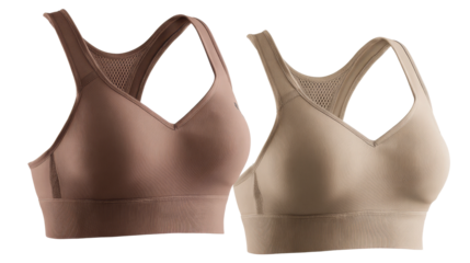 Two sports bras are present in different neutral colors on transparent background.