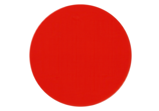 Bright red circular object on a neutral background, ideal for design and color studies