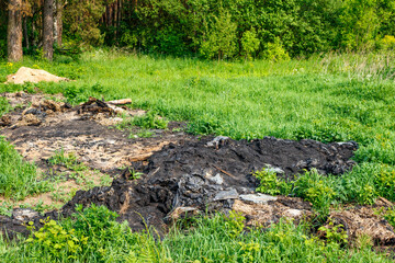 Place where old polyethylene film was burned