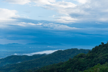 Beautiful Mountain landscape foggy windy mountain range green landscape asian farm. Amazing Landscape mountain green field meadow white cloud blue sky on sunrise. Countryside sunlight heaven scenery