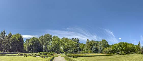 picturesque panoramic scenery of city public park on summer bright sunny day.