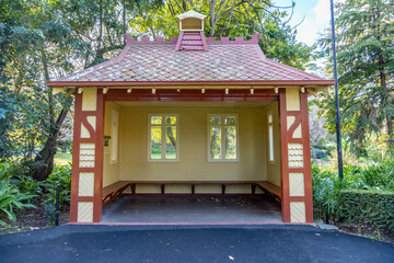 Restored historic Cabmen's Shelter with a gabled roof and ornate trims once served as a rest stop...