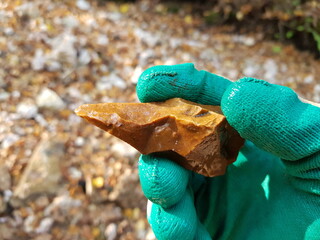 A sharpened flint that could be used as a piercing tool