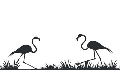 Naklejka premium Two silhouetted flamingos standing in tall grass