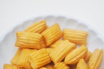 Pang-Pang Cake or Pillow Cake, a typical Indonesian sweet snack placed on a small plate.