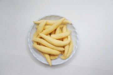 Widaran Cheese or Cheese Gabus Egg, a traditional Indonesian snack made from wheat flour, eggs, and cheddar cheese.