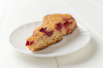 Delicious Slice of Raspberry Cake on White Plate: A Tasty Dessert Photography
