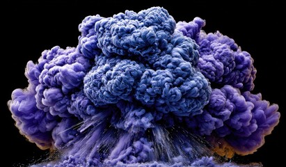 A vibrant explosion of purple and blue ink in water.