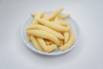 Widaran Cheese or Cheese Gabus Egg, a traditional Indonesian snack made from wheat flour, eggs, and cheddar cheese.