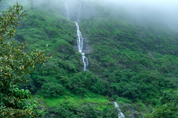 A waterfall during the monsoons near Pune India. Monsoon is the annual rainy season in India from June to September.