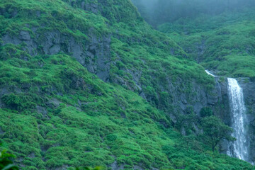 A waterfall during the monsoons near Pune India. Monsoon is the annual rainy season in India from June to September.