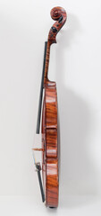Old violin right side on white background