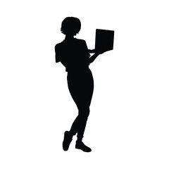 Silhouette of a woman holding a laptop in a dynamic pose