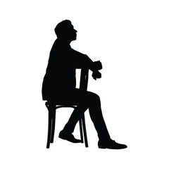 Silhouette of a Seated Man in Thoughtful Pose on Chair