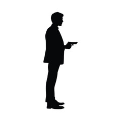 Silhouette of a Standing Man Holding a Gun