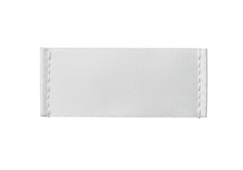 A blank white fabric label with stitched edges, isolated on a transparent background
