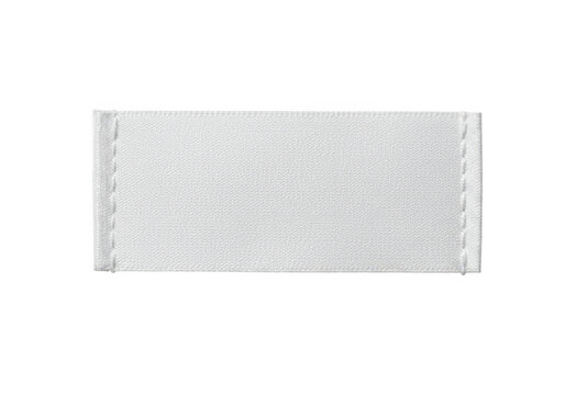 A blank white fabric label with stitched edges, isolated on a transparent background