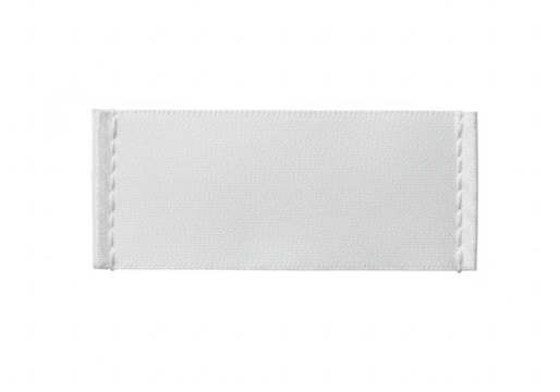 A blank white fabric label with stitched edges, isolated on a transparent background