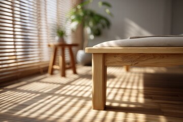 Massage bed covered in crisp white in a minimalist spa room