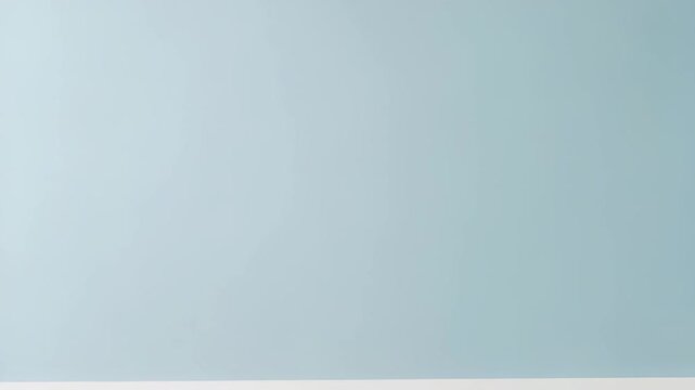 Simple Light Blue Wall with Wooden Floor Interior in Minimalist Design