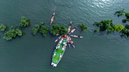 Areal view landscape  of Tanguar Haor, Sunamganj, Bangladesh. Traditional boats with a houseboat at...