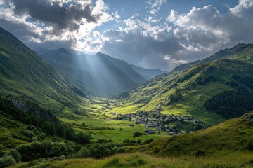 Fototapeta premium Sunbeams pierce clouds illuminating a verdant valley village nestled in mountains