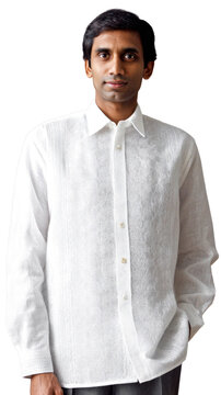 Elegant man wearing traditional white barong tagalog shirt with intricate patterns against a neutral background
