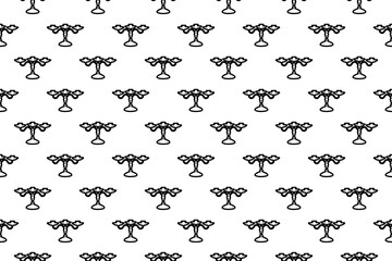 Seamless pattern completely filled with outlines of candlestick symbols. Elements are evenly spaced. Illustration on transparent background