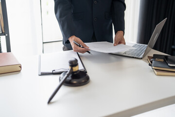 Lawyer Businessman Working with Lawbook and Gavel in Office or Courtroom for Justice Concept