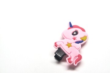 unicorn hair clip on white background