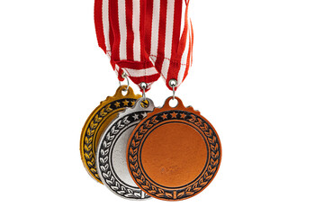 Set of the bronze, silver, and golden award medals suspended from a red and white striped ribbon...