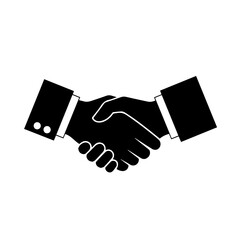 Two hands in a business handshake, symbolic of agreement and partnership.