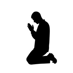 A kneeling man silently prays, hands clasped in devotion, a stark black silhouette against a white background.