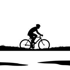 Silhouette of cyclist riding bicycle along a tranquil waterway.