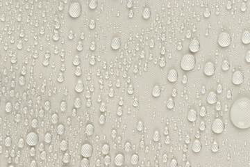 water drops on the white fabric, horizontal