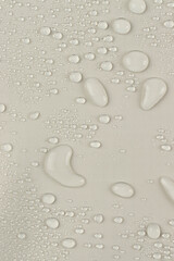 water drops on the white fabric, vertical