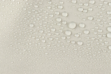 water drops on the white fabric, horizontal