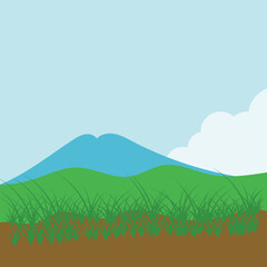 Obraz premium landscape with green grass and blue sky