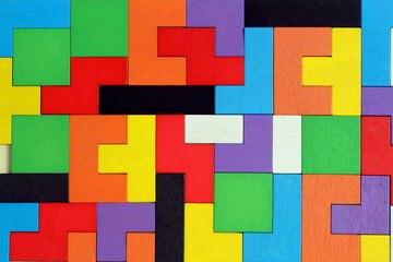 Abstract texture made of brightly colored puzzles.