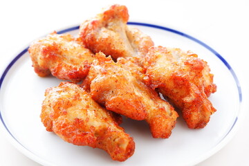 あぶり焼きチキン - 骨付き手羽元を焼き上げた、ジューシーな炙り焼きチキン
