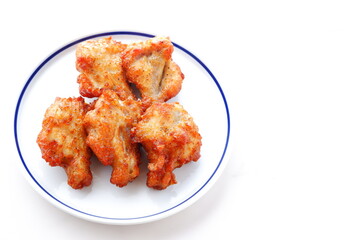 あぶり焼きチキン - 骨付き手羽元を焼き上げた、ジューシーな炙り焼きチキン
