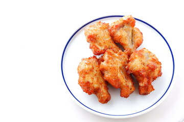 あぶり焼きチキン - 骨付き手羽元を焼き上げた、ジューシーな炙り焼きチキン
